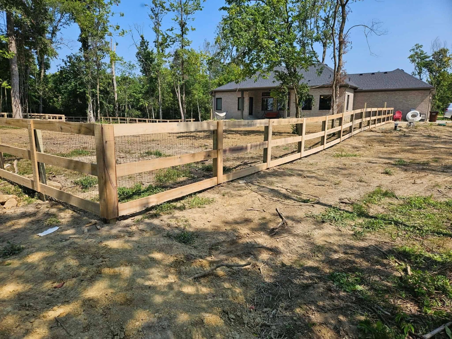 JC BANDIT wood rail and wire fence project